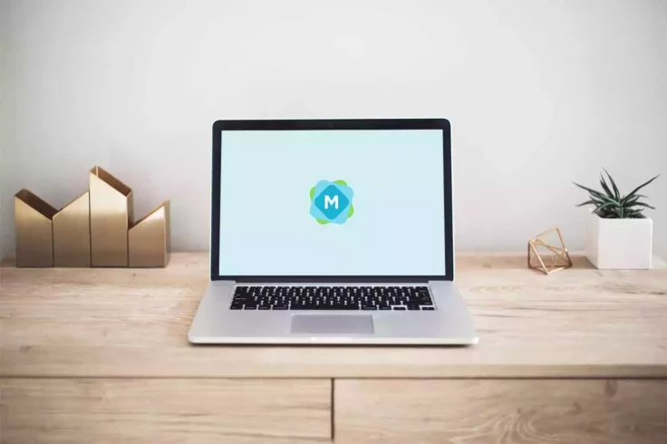 View Information about Simple MacBook Desk Scene Mockup